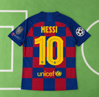 Back view of a Barcelona soccer jersey with Lionel Messi's name and number 10, laid flat on a green soccer field background. Features the club's blue and red checkered pattern, yellow lettering, and sponsor logos including UNICEF.